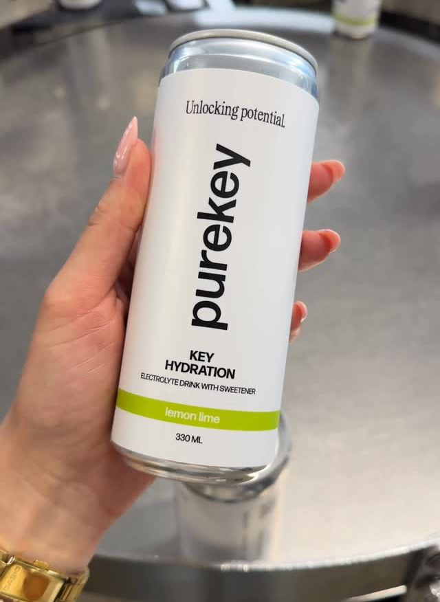 Key Hydration lemon lime can in hand