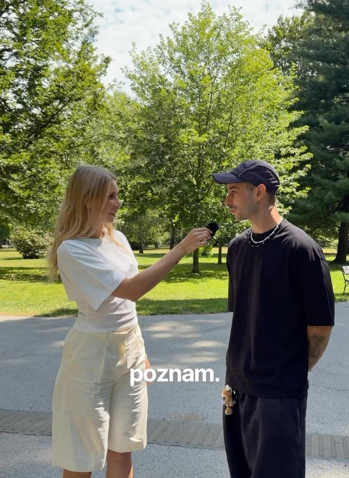 Street interview with a microphone in the park