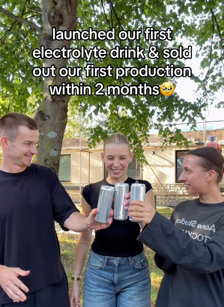 Toasting with Purekey cans after selling out the first production